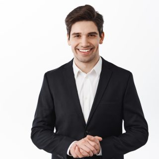 handsome-corporate-man-real-estate-agent-assistant-smiling-hold-hands-together-how-may-i-help-you-smiling-friendly-polite-assist-customer-white-background.jpg